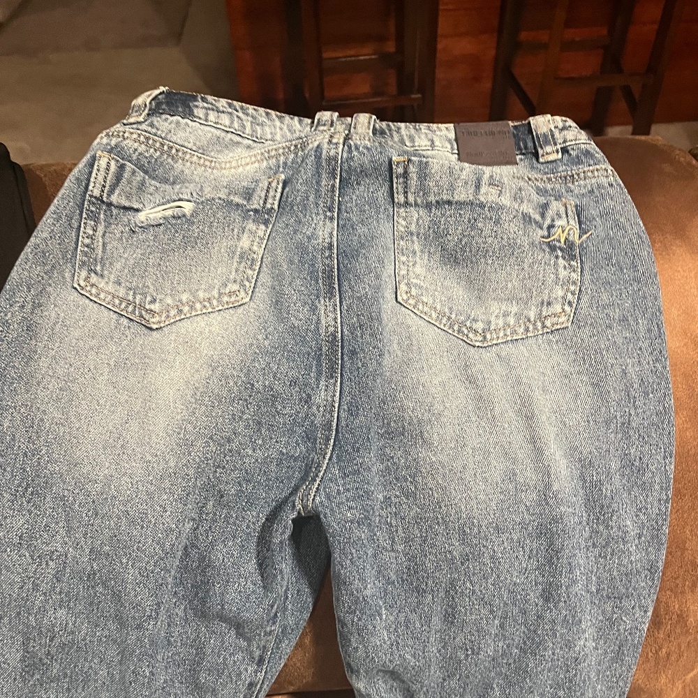 Jeans & baggy black pants never been worn.